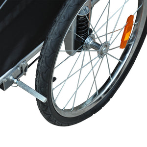 Close-up van wiel met vering van de Wit-Zwarte Hondenfietskar met Vering en Rem – Veilig en Comfortabel Vervoer