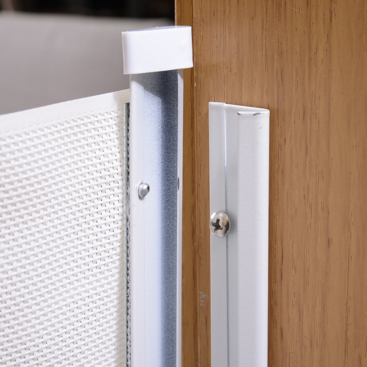 Wit Oprolbaar Veiligheidshek – 115 cm Breed voor Trappen en Deuren