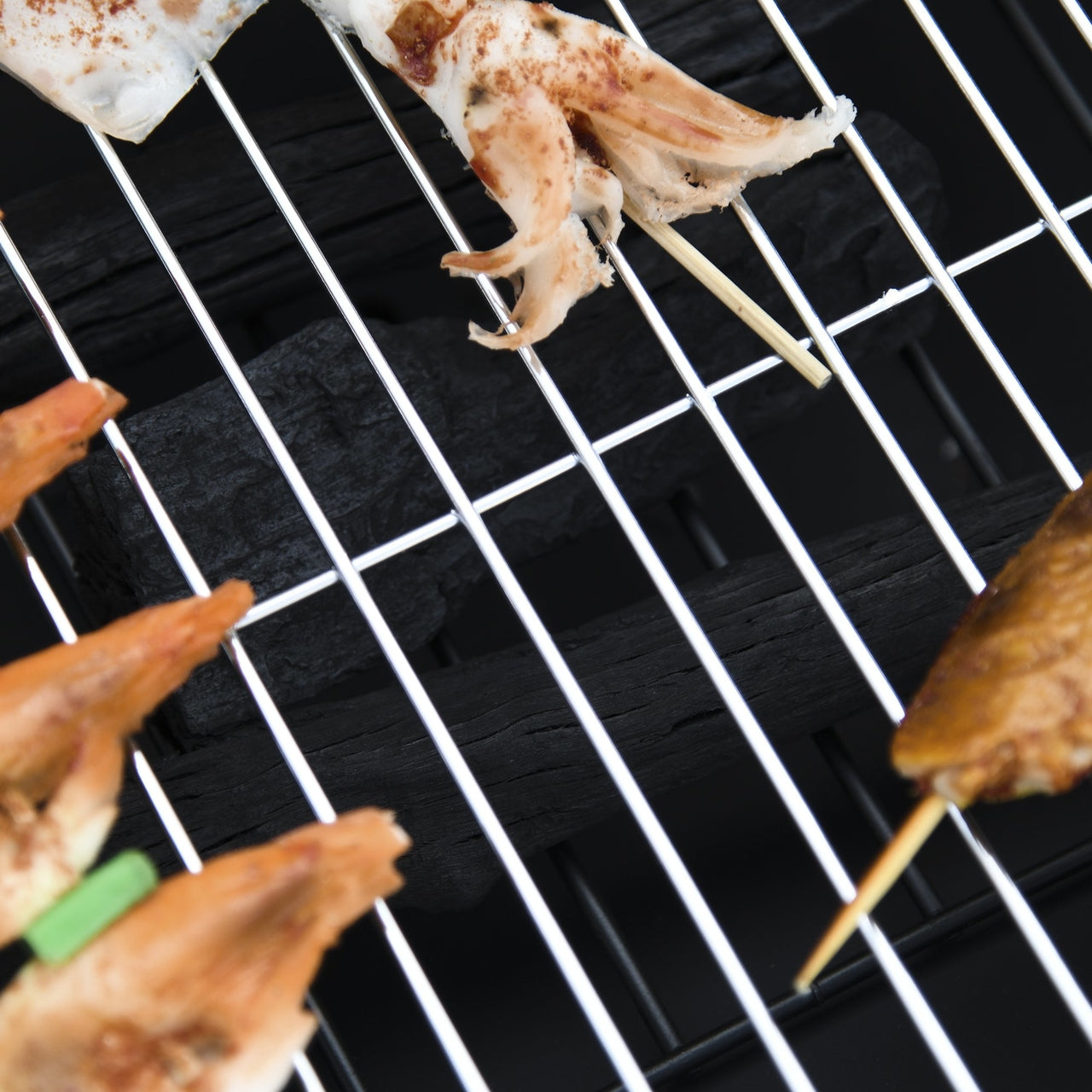 3-in-1 vuurschaal: vuurkorf, terrashaard en BBQ in zwart geverfd staal