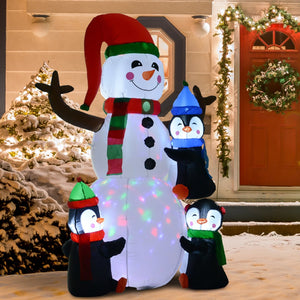 Opblaasbare LED sneeuwman met 3 pinguïns en kerstverlichting 180 cm voor sfeervolle winterdecoratie buiten sfeerbeeld