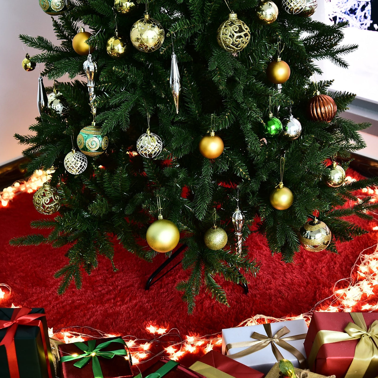 Kunstkerstboom 180 cm met hoogte 180 cm en breedte 115 cm