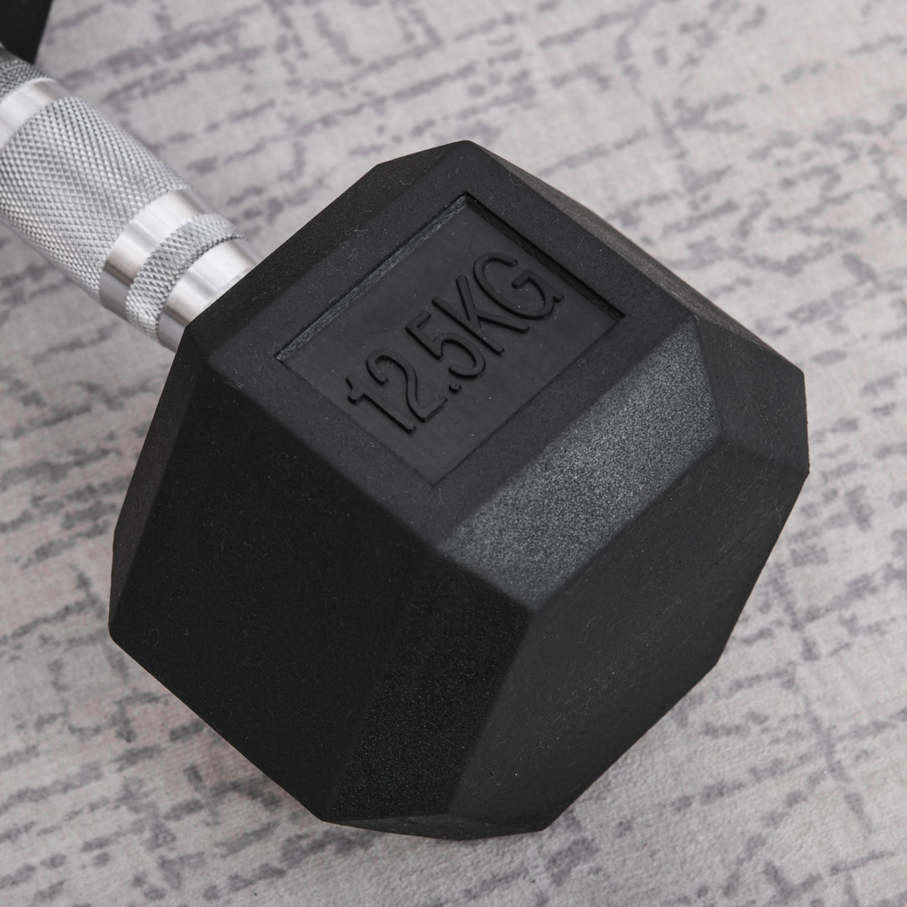Hexa dumbbell 12,5 kg met duurzame rubberen coating en stalen grip voor stabiele training