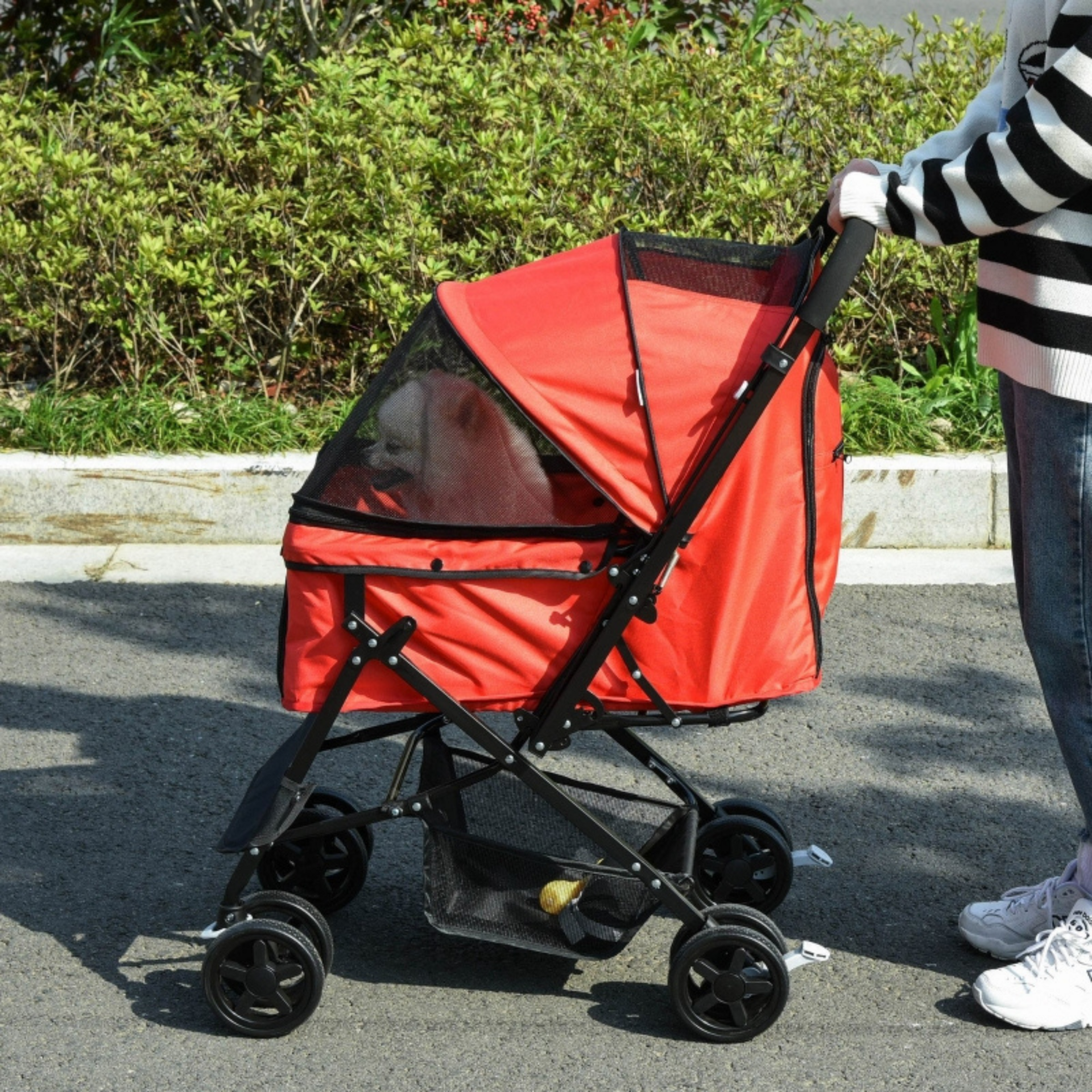 Opvouwbare rode hondenbuggy met parkeerrem en handige opbergruimte
