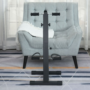 Compacte hometrainer stoelfiets 41x50x96 cm – zwart met LCD-display gepositioneerd voor een comfortabele stoel in een lichte kamer