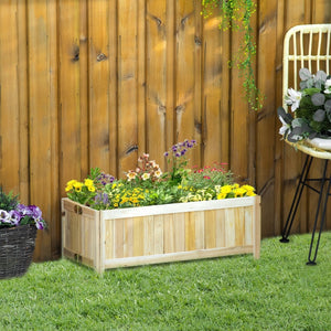 Houten bloembak 70x30x25 cm voor buitengebruik en planten gevuld met kleurrijke bloemen in een tuinsetting.