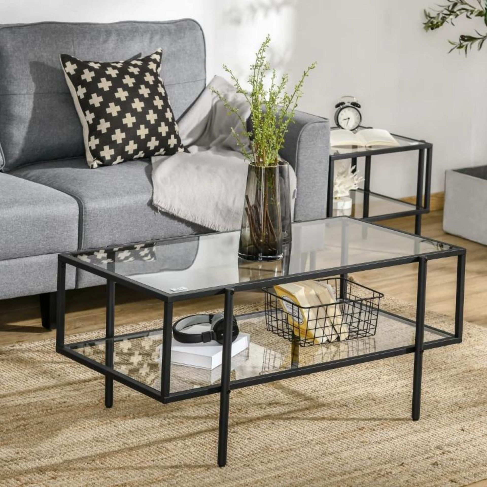 Moderne glazen salontafel met zwart metalen frame – 100x55 cm