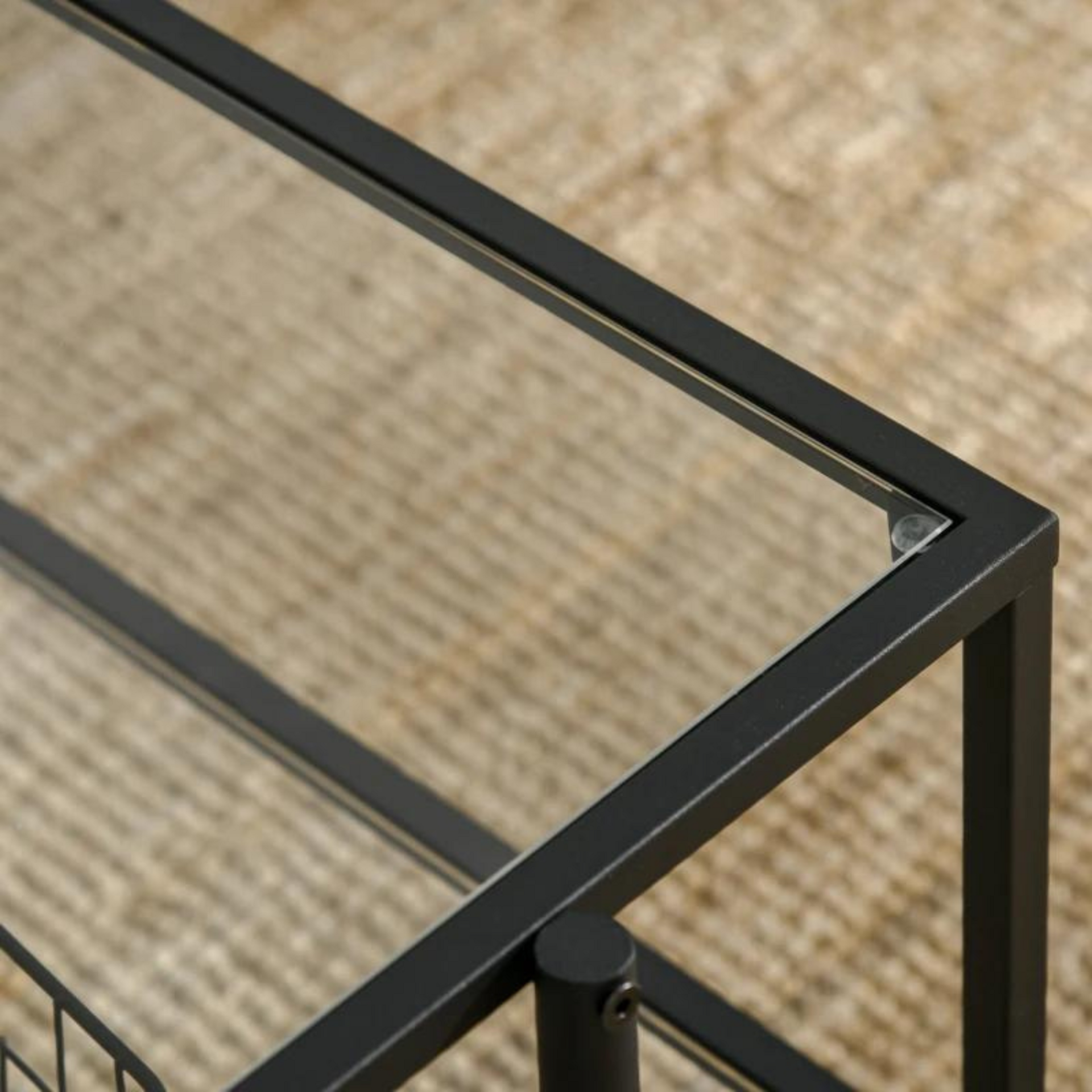 Moderne glazen salontafel met zwart metalen frame – 100x55 cm