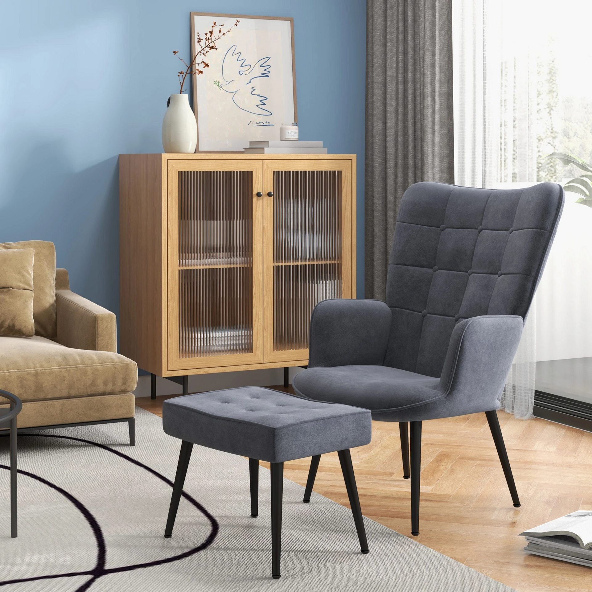 Donkergrijze fauteuil met voetenbankje – comfortabel zitten in stijlvol design