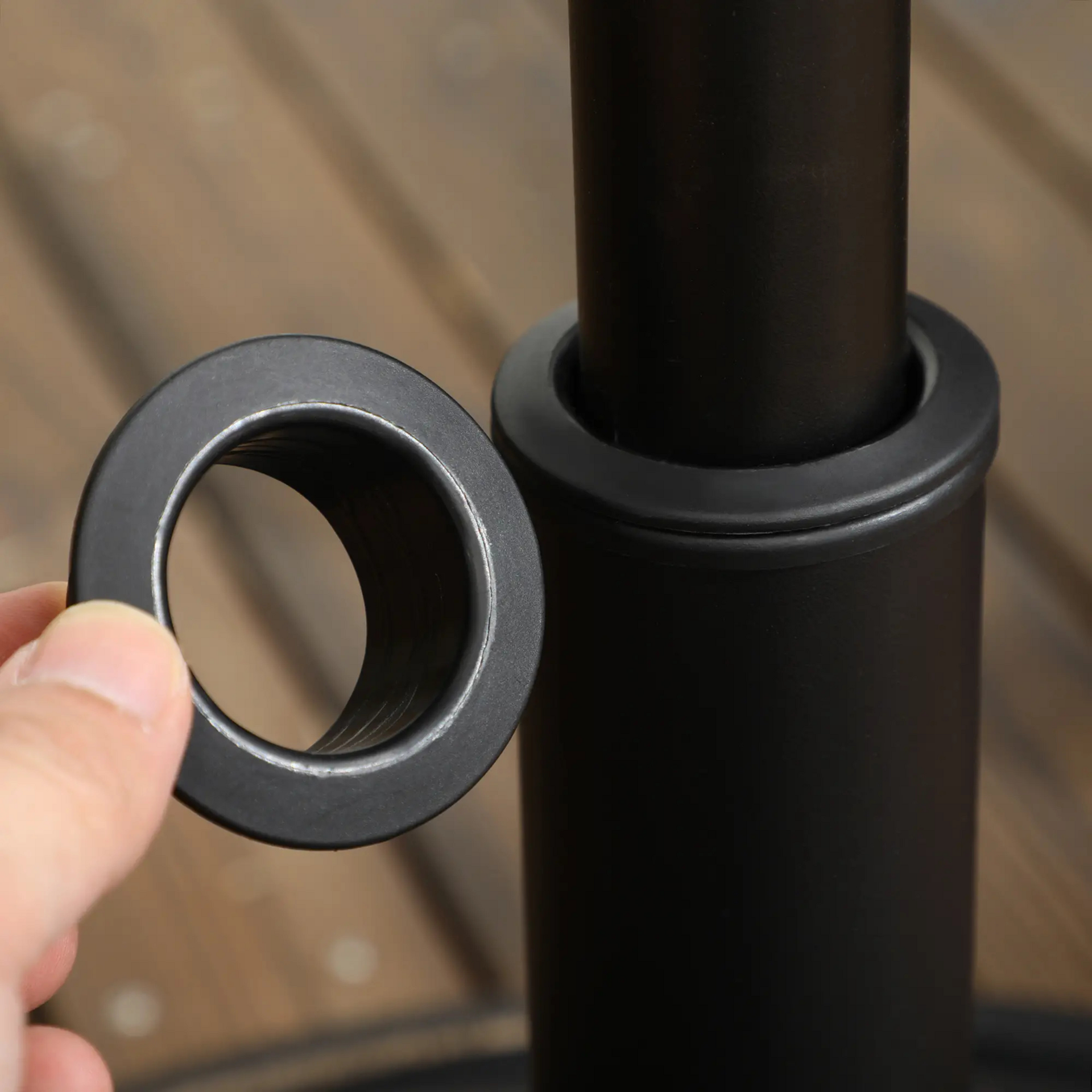 Zwarte parasolvoet 18 kg – Ø53,5 cm kunststof en staal, geschikt voor Ø38–48 mm stelen